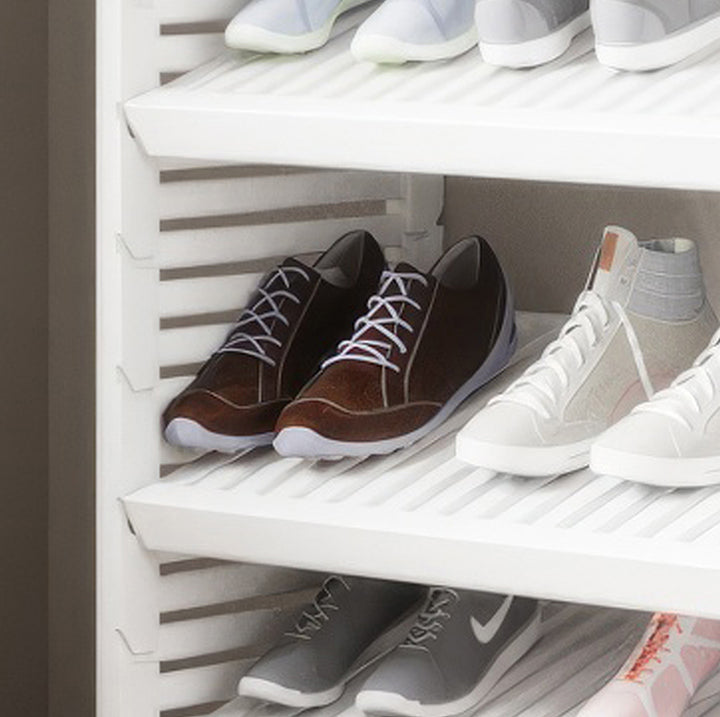 Closeup image of how shelves an be used as shoe shelving in a John Louis Home closet organizer