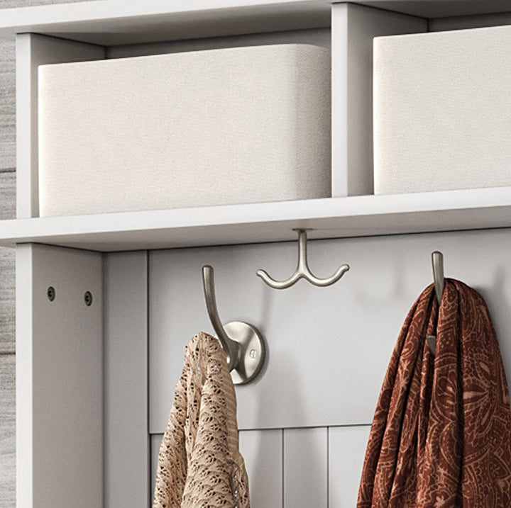 closeup image of the John Louis Home hall tree tweed cubby bins included